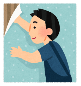 男性が新しく壁紙を貼っているイラスト